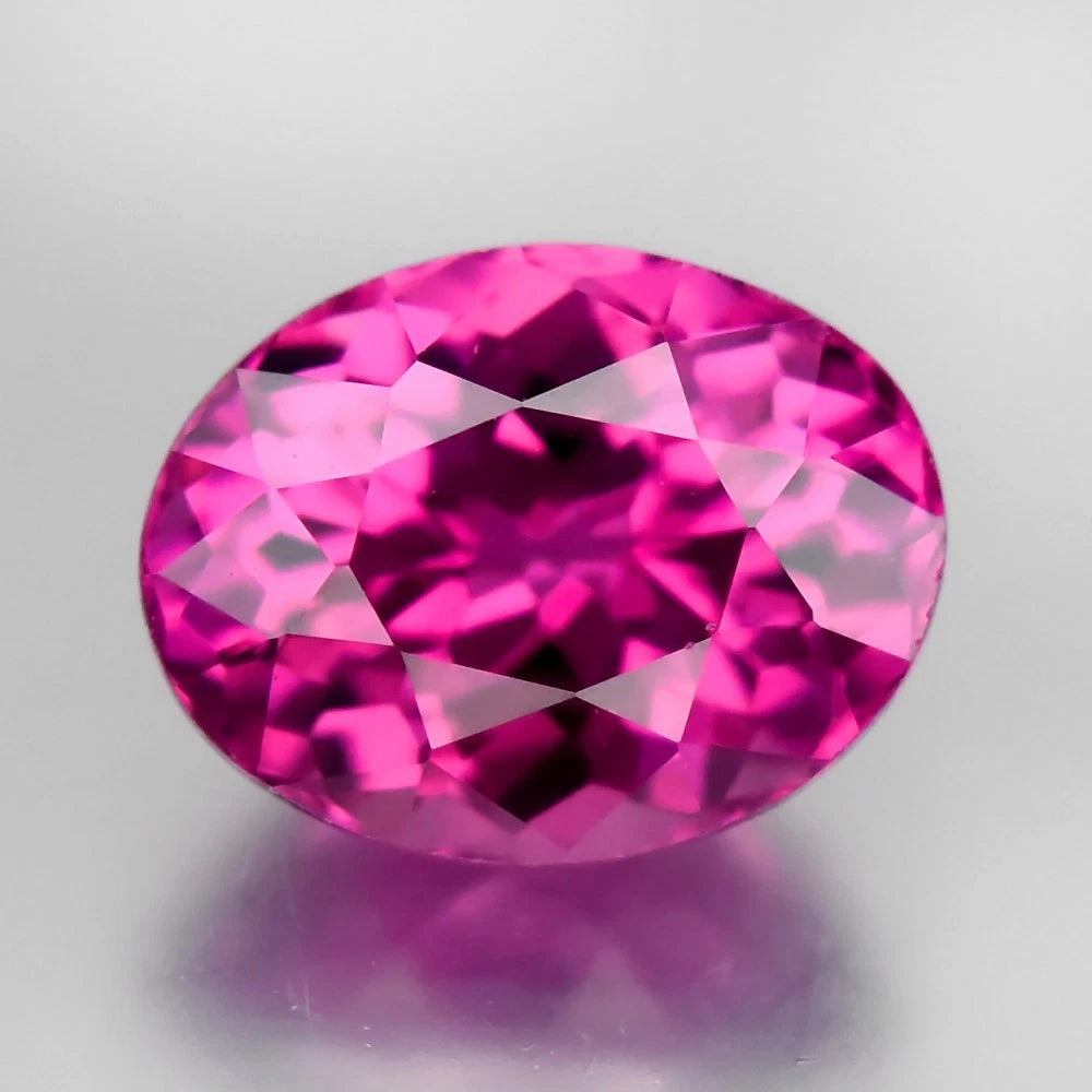 1.19ct IF Oval Natural Fuchsia Rosella Pink Umbalite Garnet
