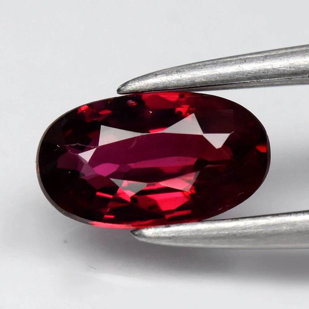 0.50ct 6.5x3.7mm VS Oval Purplish Red Ruby - Unheated, Madagascar Gem