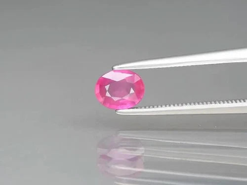 CERTIFICATE Incl.* 0.66ct Oval Unheated Purple-Red Ruby Gemstone, Mozambique - Video 1 of 1