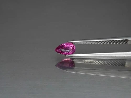 CERTIFICATE Incl.* 0.67ct VS Pear Natural Unheated Purplish Pink Sapphire - Video 1 of 1