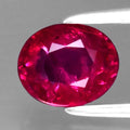 1.00ct 6.3x5mm Oval Natural Pinkish Red Ruby, Mozambique (Heated Glass Filling)