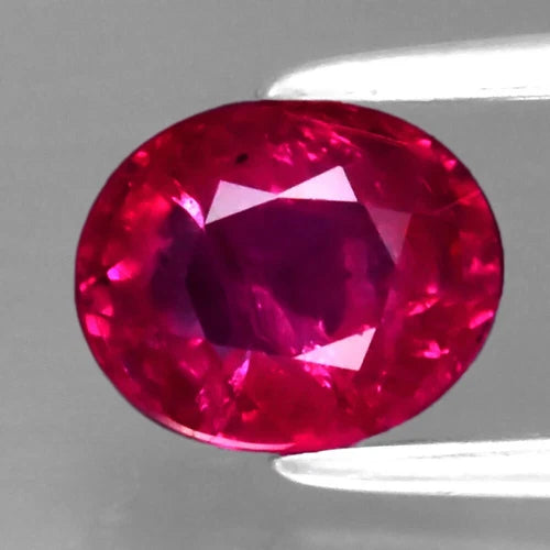 1.00ct 6.3x5mm Oval Natural Pinkish Red Ruby, Mozambique (Heated Glass Filling)