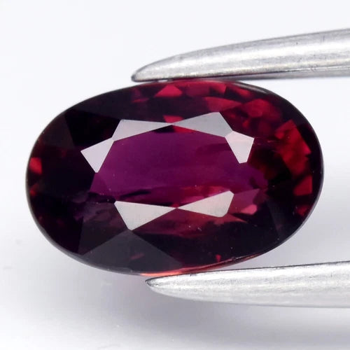 0.85ct 6.3x4.2mm Oval Purplish Red Ruby - Unheated, Madagascar Gem