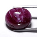 22.57ct Oval Cabochon Purplish Red Ruby - Heated Glass Filled, Africa Gemstone