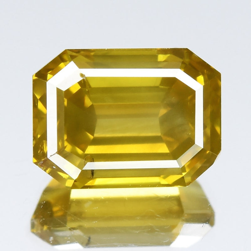 1.34ct 6.86x5.06mm Emerald Cut Natural Treated Fancy Yellow Diamond SI2