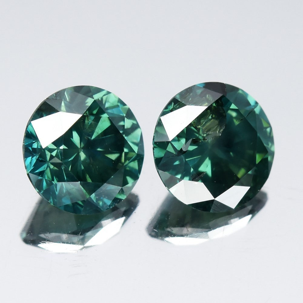 Pair 2p/1.92ct Round Brilliant Natural Treated Fancy Bluish Green Diamond SI1