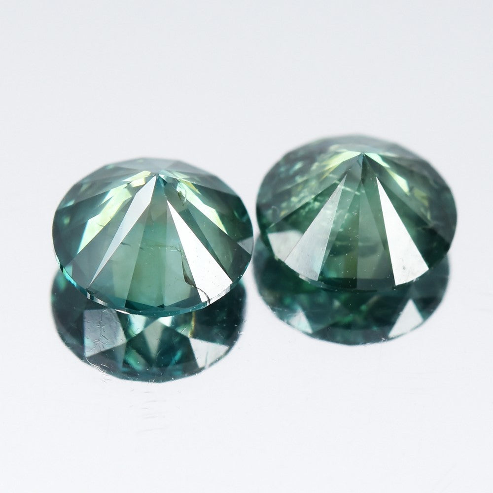 Pair 2p/1.92ct Round Brilliant Natural Treated Fancy Bluish Green Diamond SI1