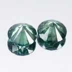 Pair 2p/1.92ct Round Brilliant Natural Treated Fancy Bluish Green Diamond SI1