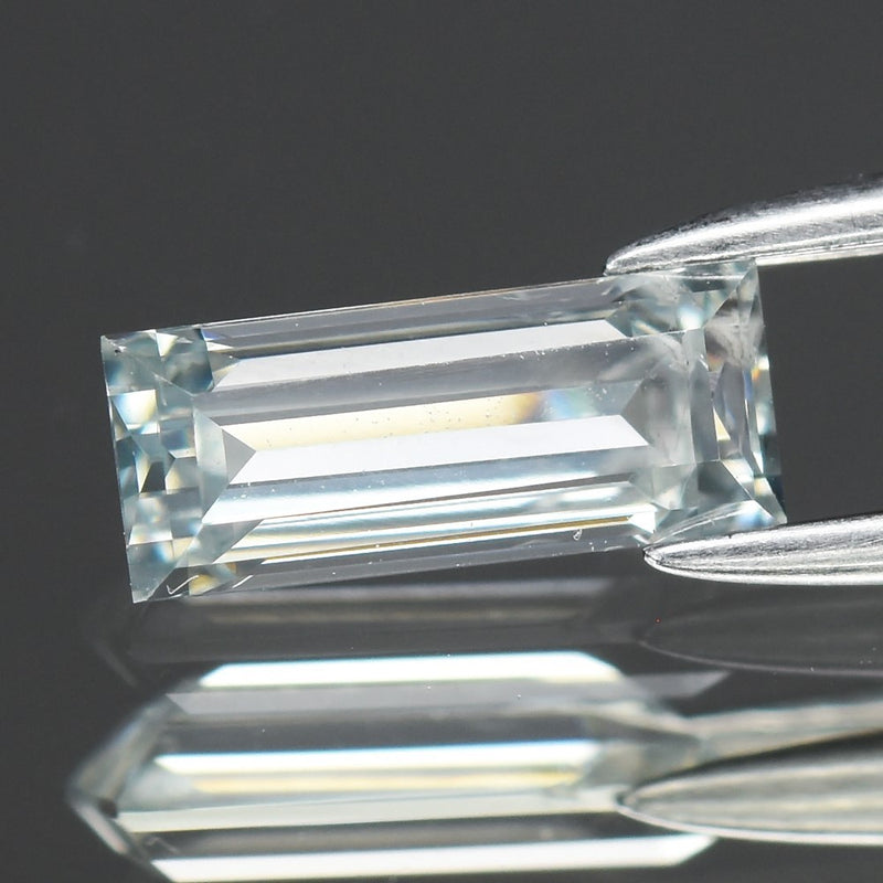 0.59ct 7.48x3.06mm Baguette Natural Treated Fancy Light Blue Diamond VS2