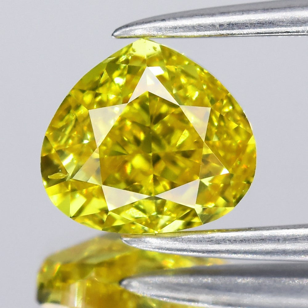 0.88ct Heart Natural Treated Fancy Vivid Yellow Diamond VVS1 Africa